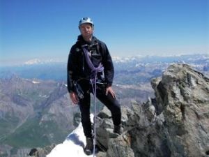 Standing on the summit of the Grand Pic de la Meije