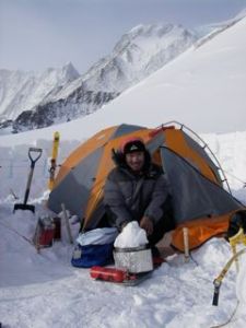 Namgya snowmelting for tea! Mt. Vinson 2009.